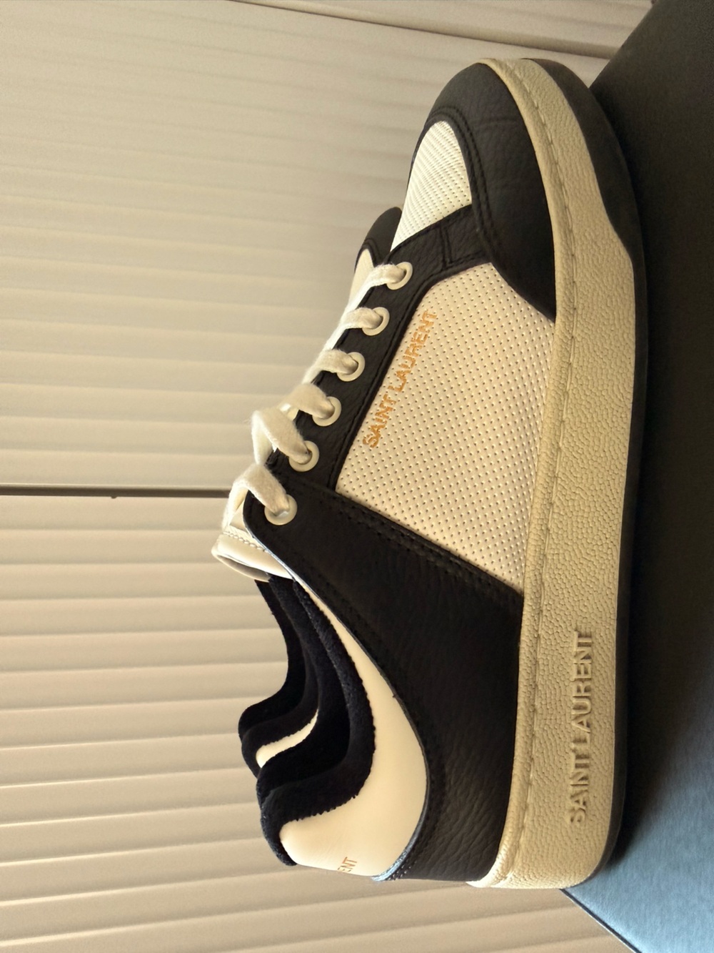 Saint Laurent Black and White Low-Top Leather Sneakers with Gold Logo